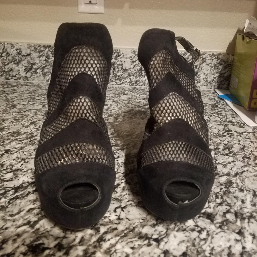 Size 7.5, black, heels.